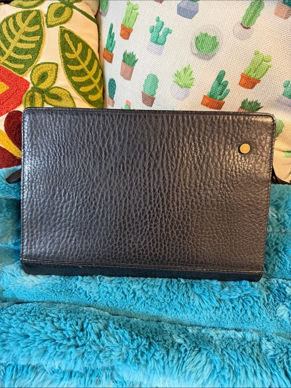 Burberry’s Wristlet or Planner
